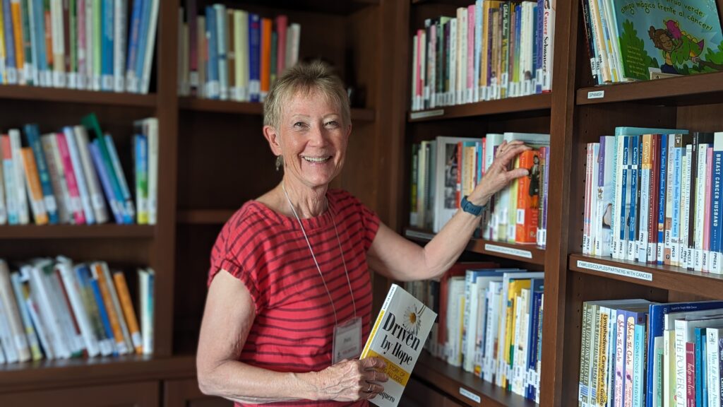 Photo of Patti Wise in the Gilda's Club Madison library