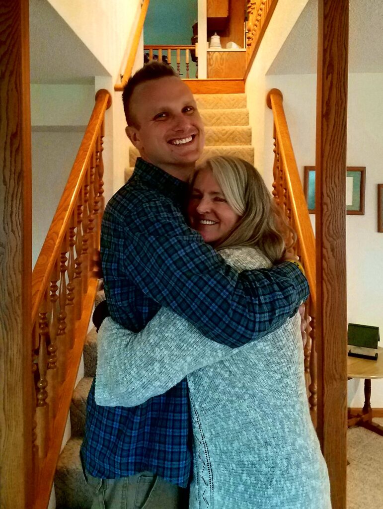 Rob hugs his mom Joyce